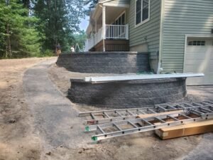 Masonry Stone retaining wall built for landscape support and visual appeal