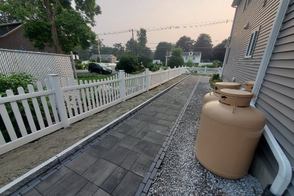 Custom walkway built with interlocking pavers for a clean and functional path