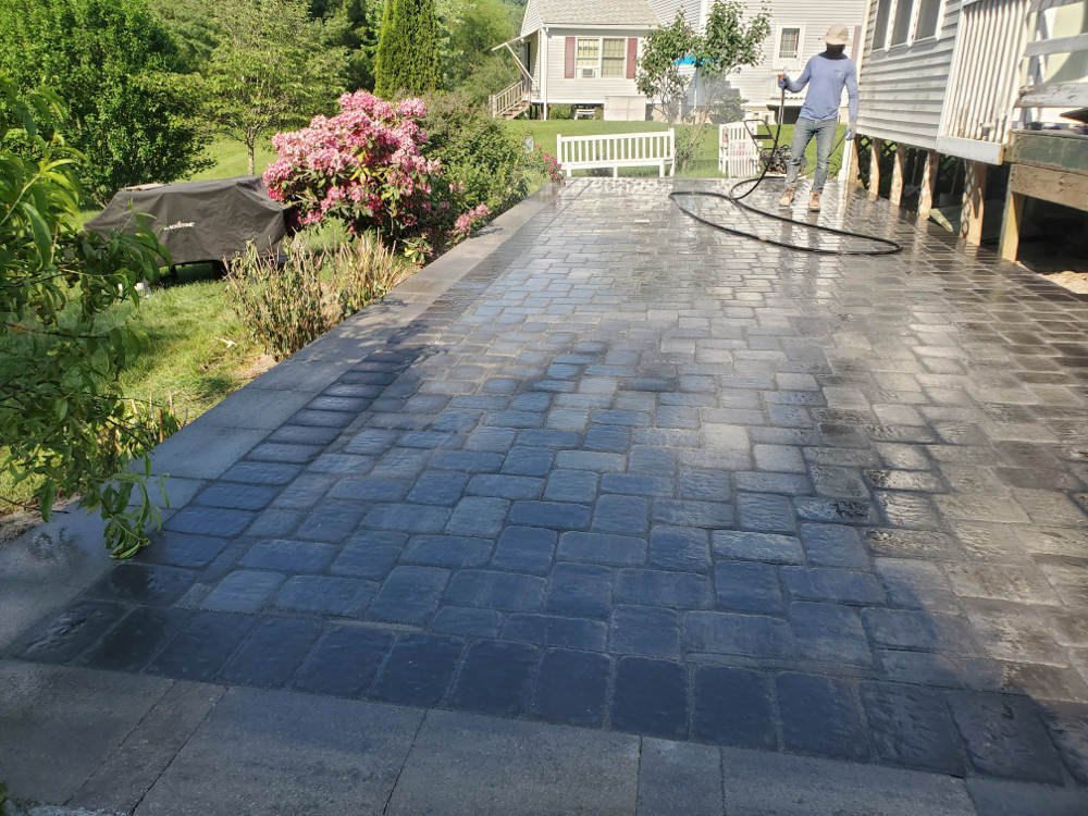 Masonry paver patio installation with high-quality stonework in New Hampshire