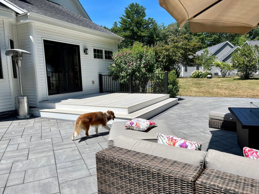 Masonry paver patio installation in Nashua NH with custom stone layout